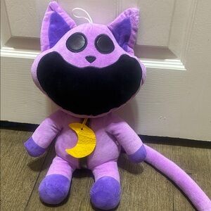Purple Cat Plush Toy with Black Accents